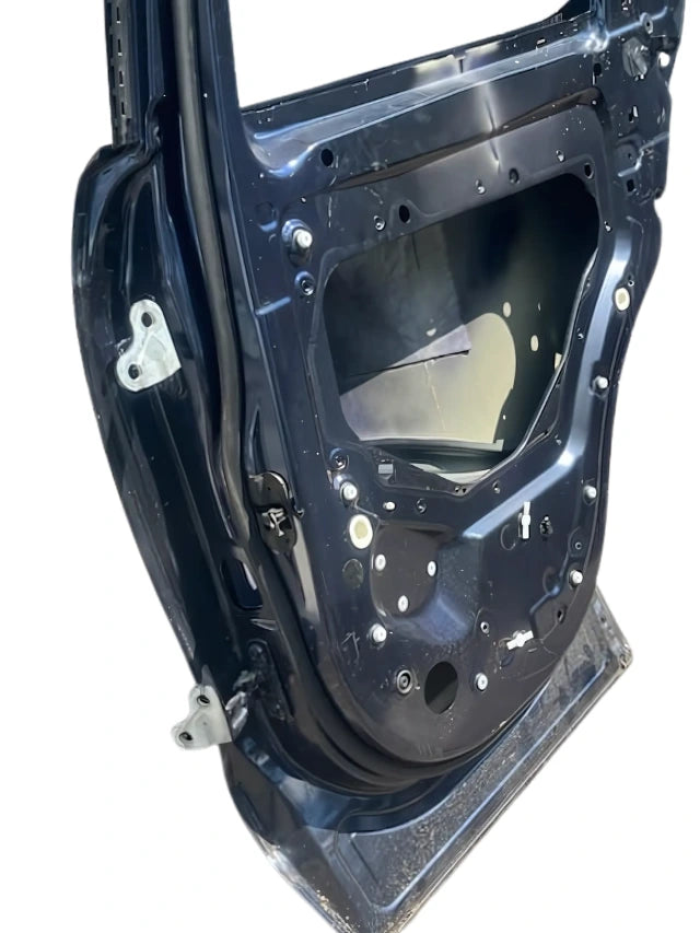 Roverland Parts black metal rear door frame without panels showing mounting holes and interior structure
