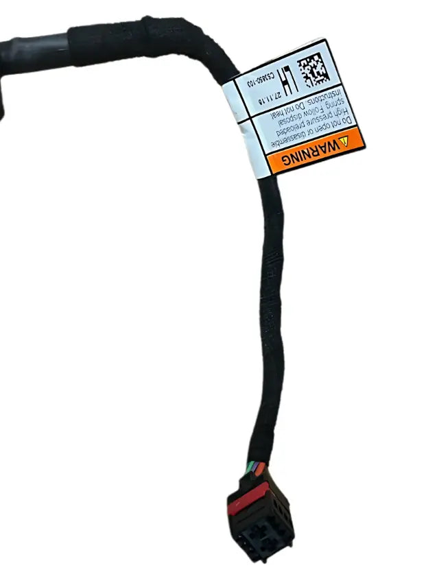 Roverland Parts Tailgate Strut Left Rear wiring harness connector with warning label