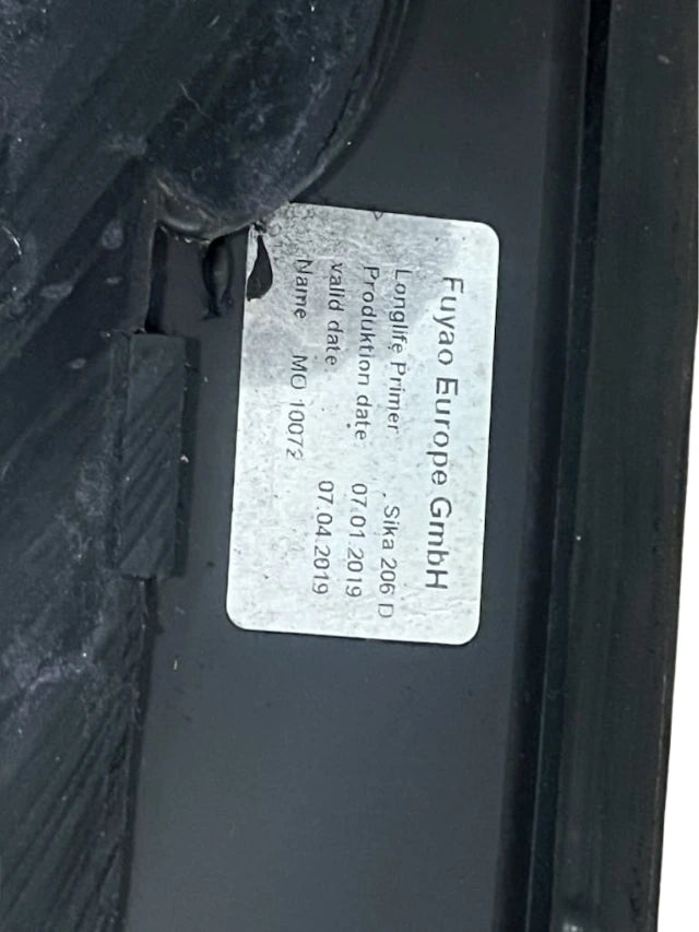 Close-up of Roverland Parts metal bracket component for Quarter Glass Right Rear installation