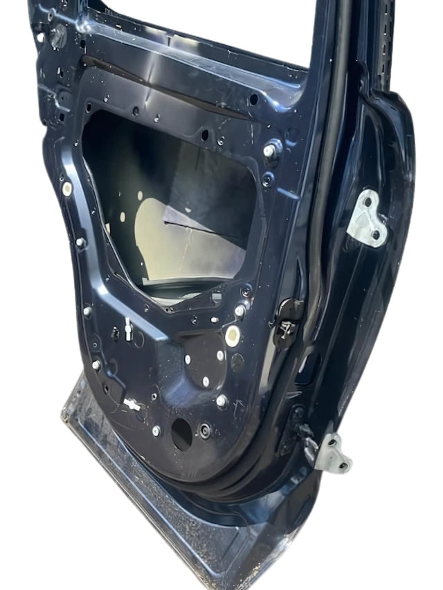 Roverland Parts rear door inner panel in black with mounting holes and latch mechanism