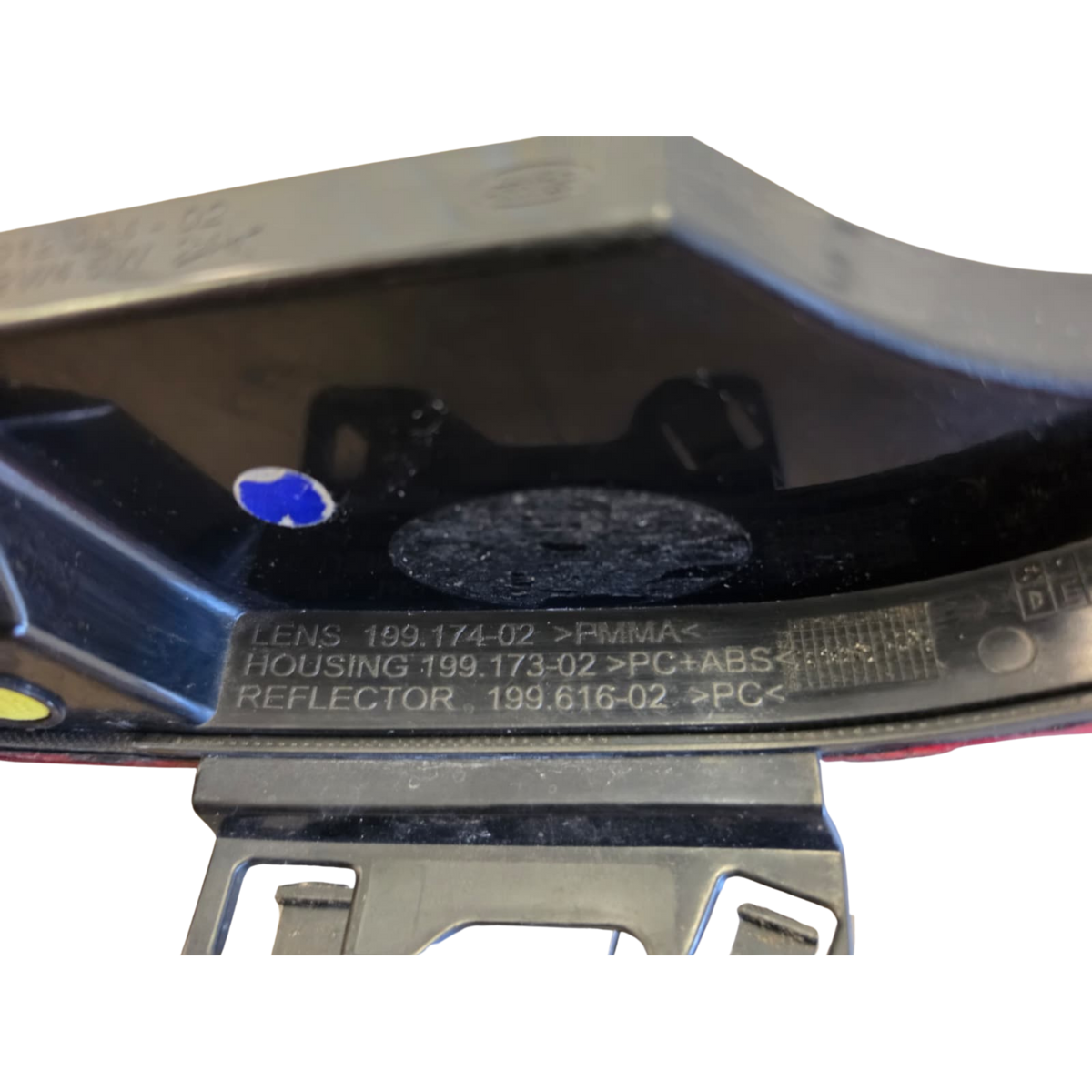 Close-up of Roverland Parts Reflector with detailed text and housing specifications