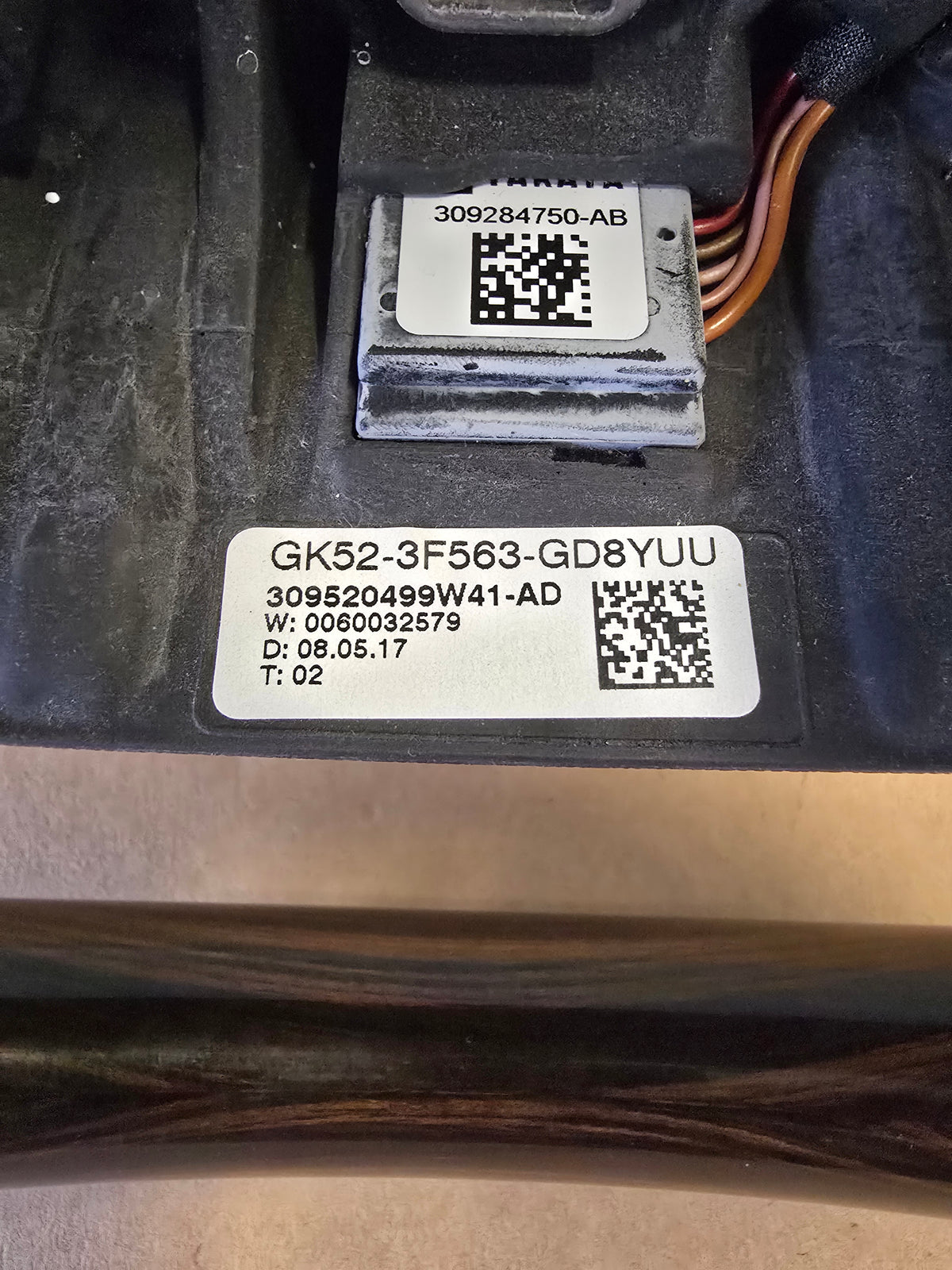 Roverland Parts GK52-3F563-GD8YUU car component with QR code labels for identification