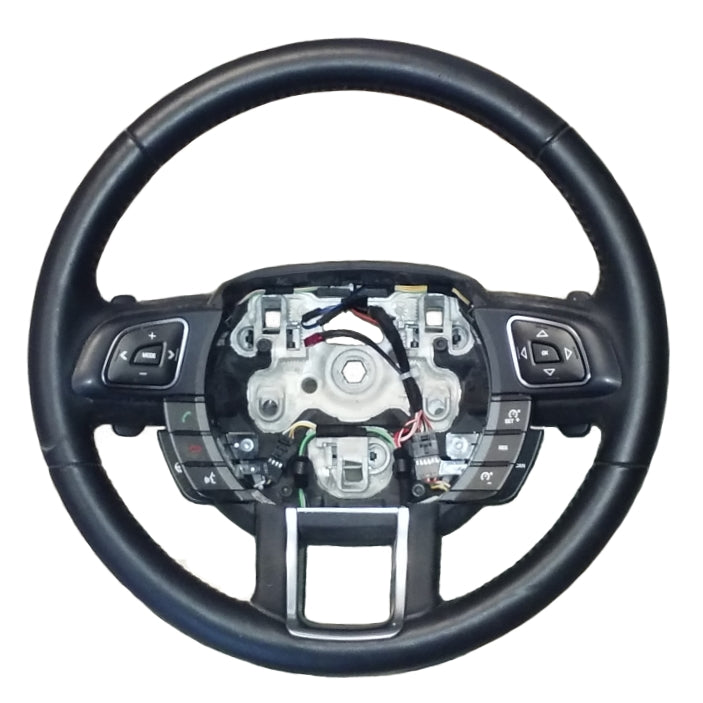 Range Rover steering wheel part with control buttons and wiring exposed for vehicle repair