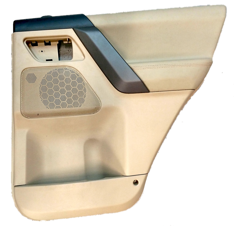 Beige and black LR2 Parts door panel with speaker grill and door trim detailing