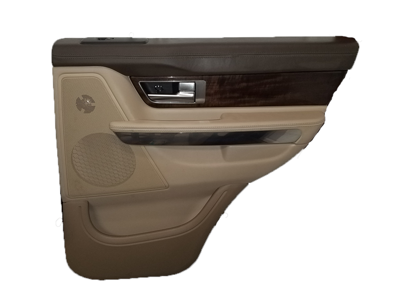 Range Rover door panel in beige and brown with speaker and chrome handle