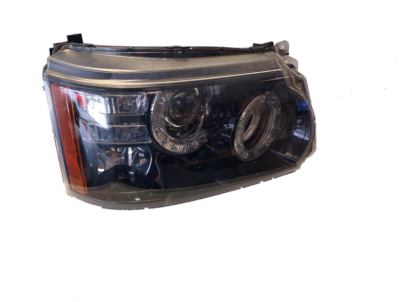 Range Rover parts headlight with clear lens and integrated amber reflector