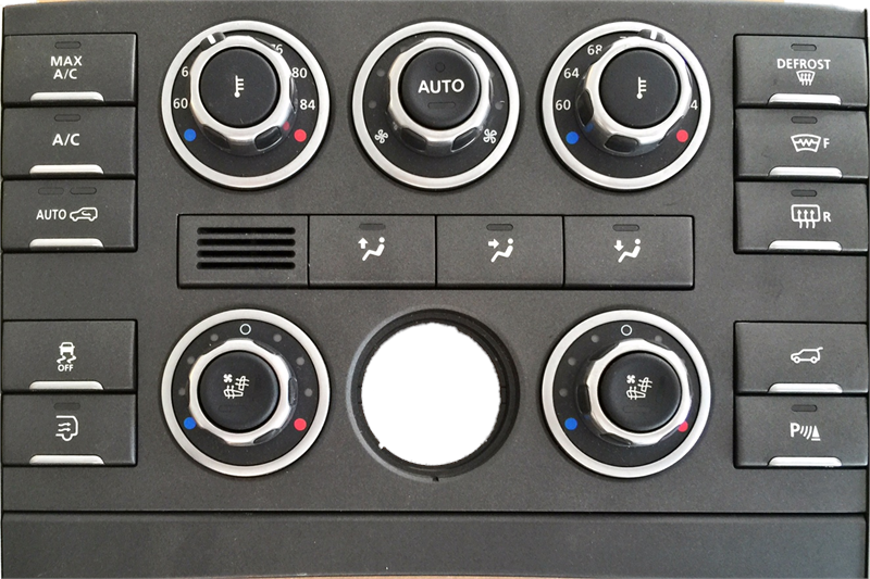 Range Rover temperature control panel with dials and buttons for air conditioning and defrost functions
