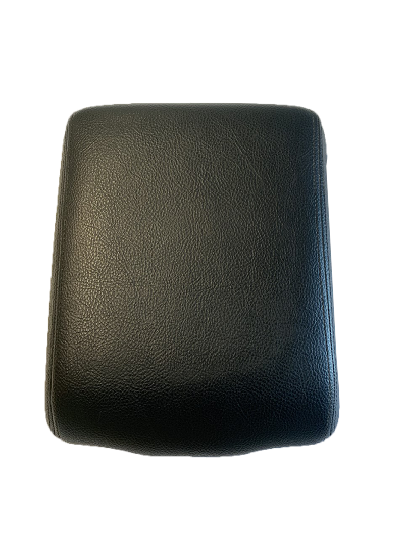 Black leather Discovery center console replacement part with textured finish