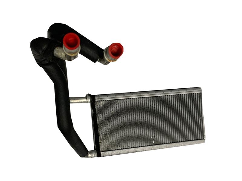 Range Rover core heater radiator part with metal fins and black insulated pipes