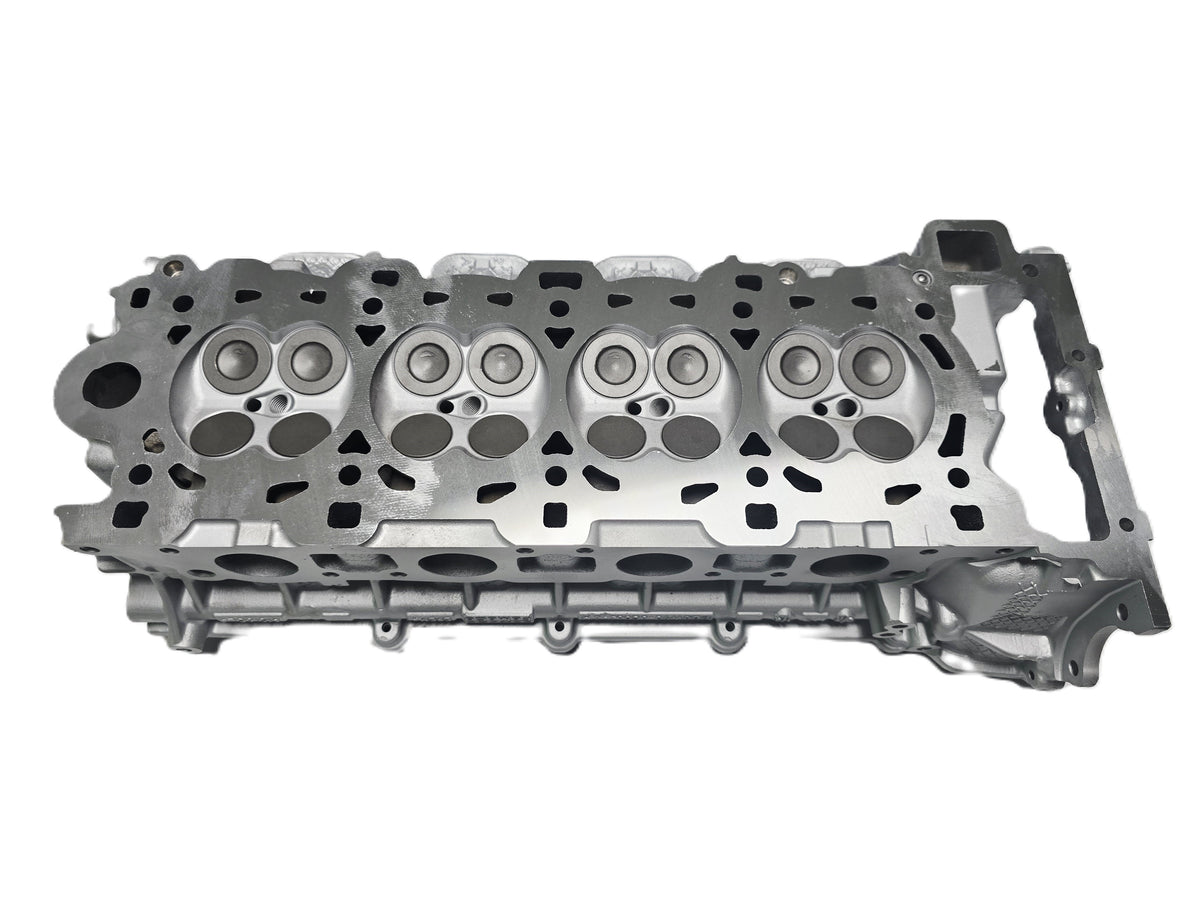 Land Rover Range Rover Parts aluminum engine cylinder head showing four combustion chambers for engine replacement