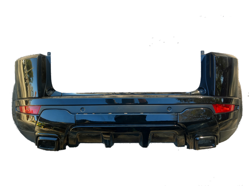 Glossy black Evoque Parts rear bumper with integrated exhaust cutouts and reflector lights
