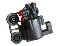Range Rover solenoid part featuring black housing with red caps and mounting components