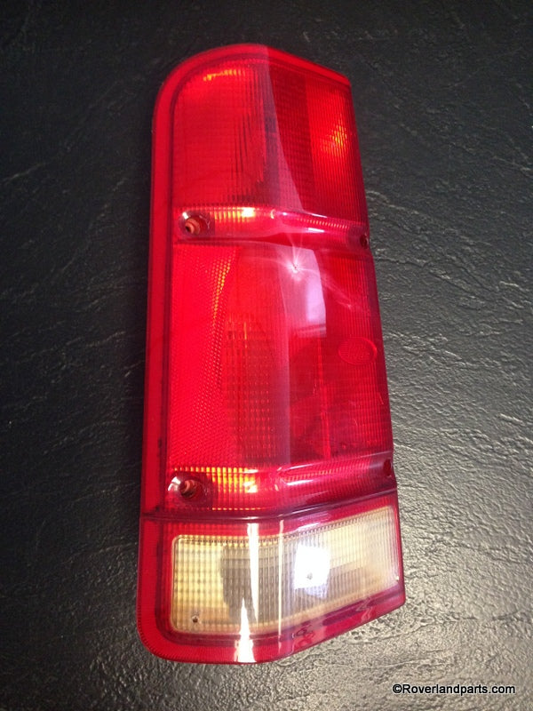 Discovery Parts tail light with red and white sections for vehicle rear lighting replacement