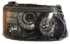 Range Rover headlight assembly with clear lens and circular projector elements