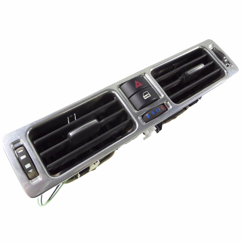 Range Rover instrument panel air vent assembly with hazard and window control buttons