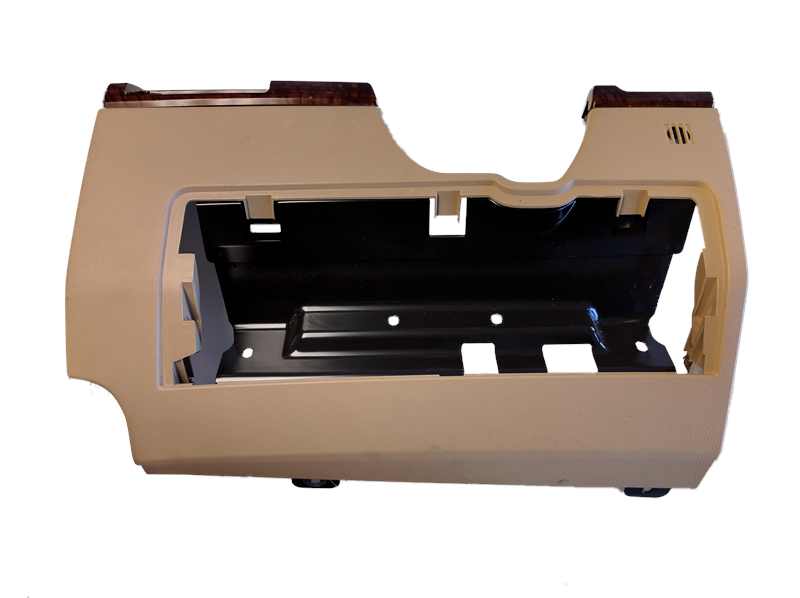 Beige LR2 Parts Knee Bolster panel with black mounting frame and wood trim accents