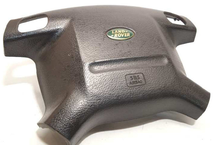 Black Land Rover Discovery Airbag cover with Land Rover emblem and SRS Airbag label