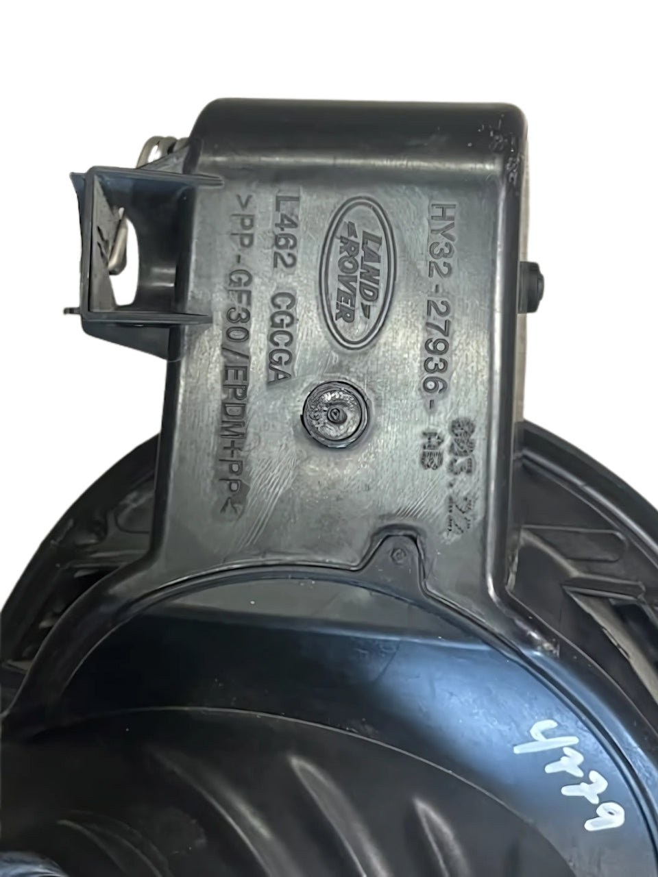 Black Land Rover Discovery Fuel Door Assembly with molded Land Rover logo and part numbers