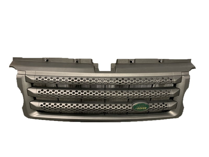 Range Rover grille part DHB500062WWR with silver finish and green Rover emblem