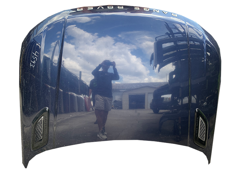 Shiny dark blue Range Rover hood with vents and Range Rover branding on top
