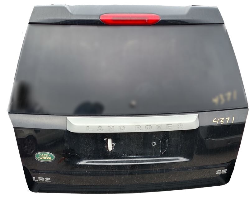 Black Land Rover LR2 rear tailgate glass with built-in brake light and Land Rover emblem