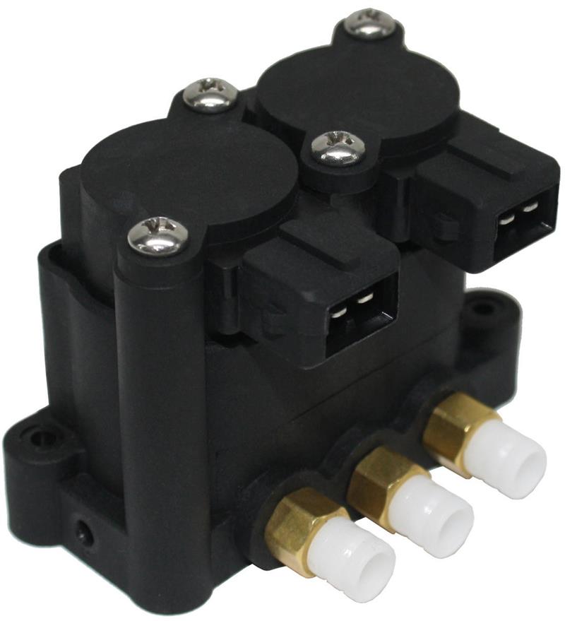 Discovery Land Rover suspension valve block with black plastic housing and brass fittings