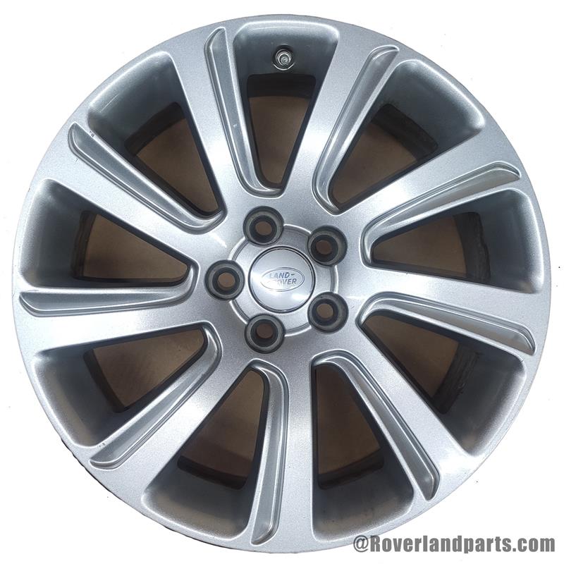 Range Rover Discovery Sport Parts silver alloy wheel with multi-spoke design and Land Rover center cap