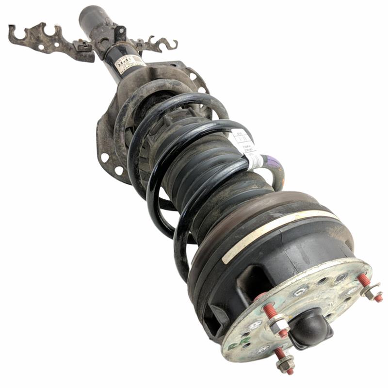 Loaded Land Rover Evoque suspension strut assembly part for vehicle shock absorption