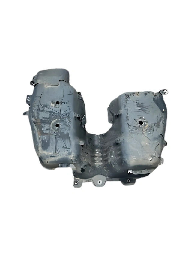 Roverland Parts metal Fuel Tank Shield with scuffs and mounting points visible for off road vehicle protection