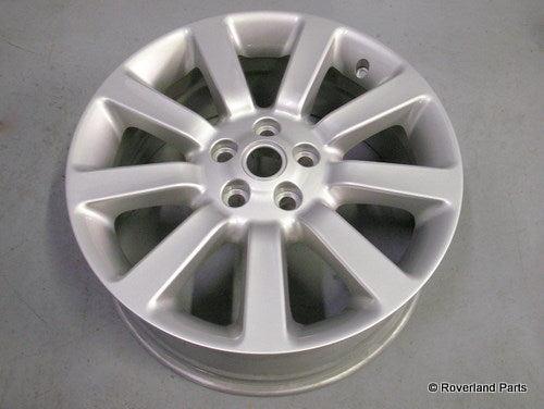 Silver alloy 2006-2011 Range Rover wheel with multi-spoke design and center cap holes