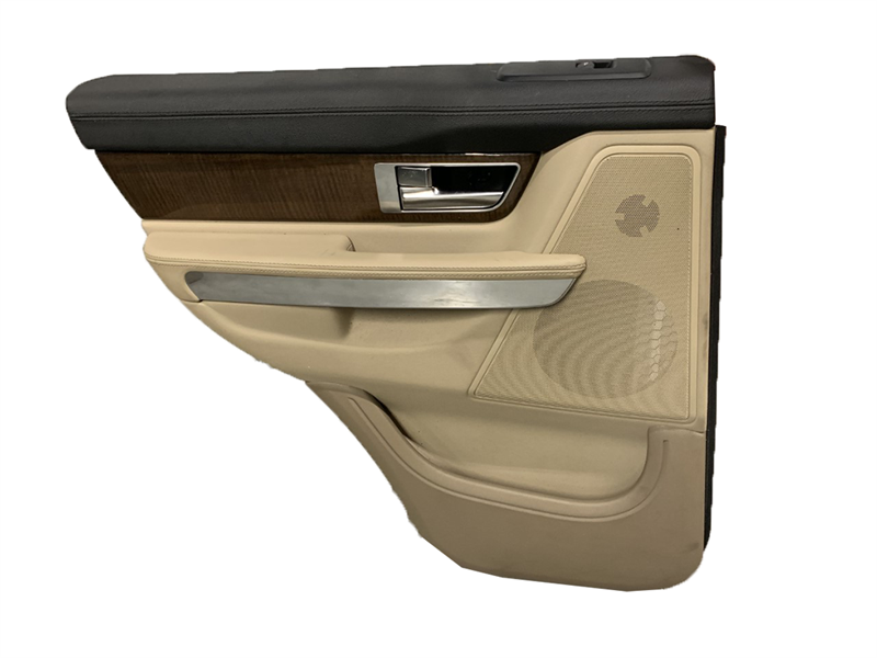 Range Rover tan and black car door panel with wood trim and silver handle replacement part