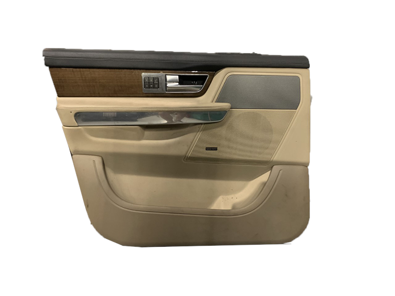 Range Rover beige and black interior door panel with wood trim and control buttons