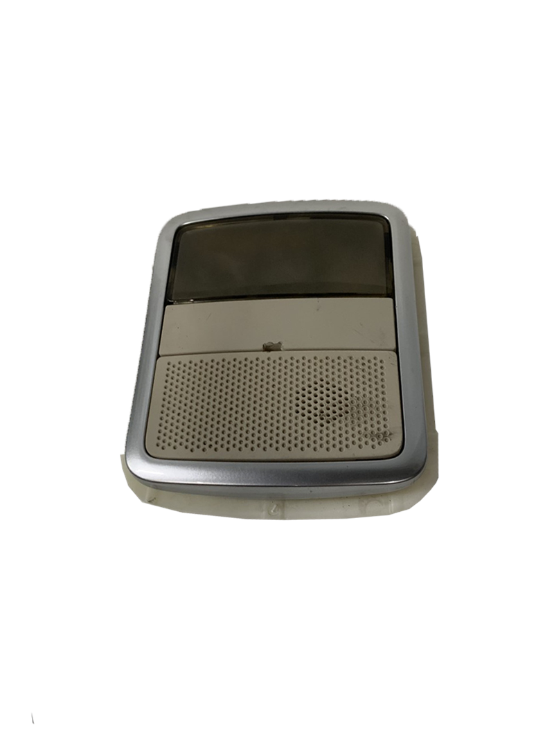Range Rover overhead interior light assembly with speaker grille and silver trim