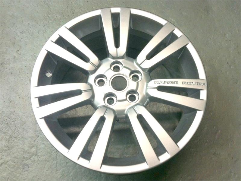Range Rover silver alloy wheel rim with dual spoke design for Range Rover parts