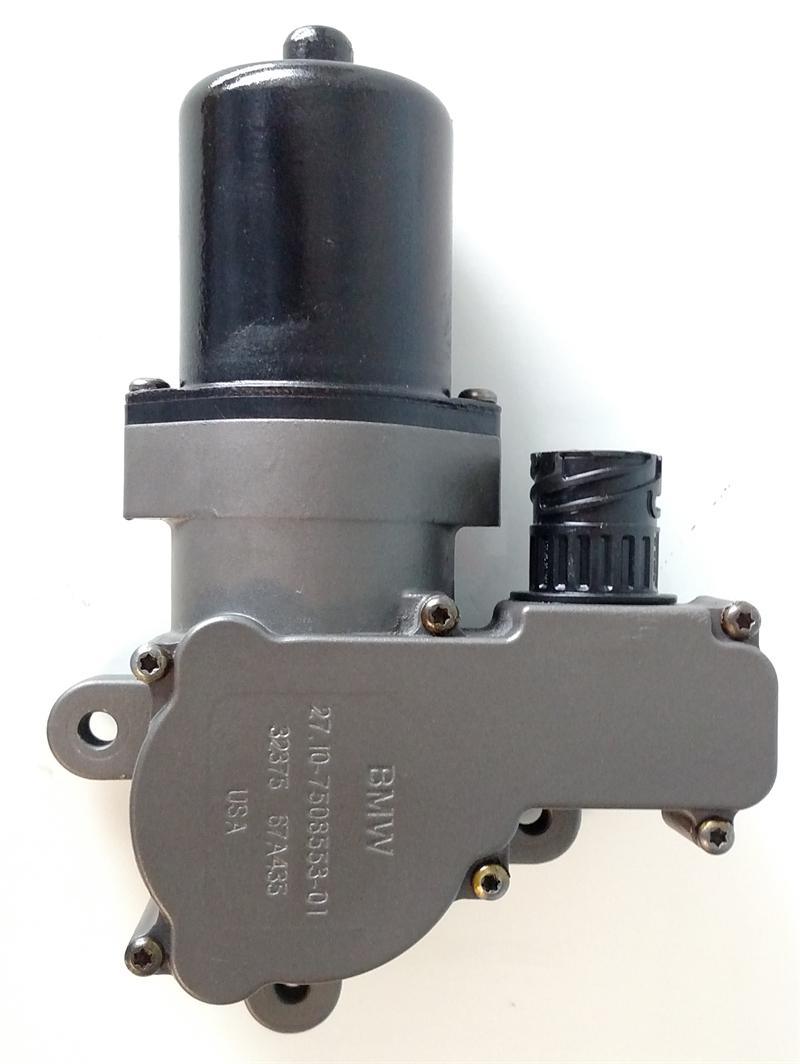 Range Rover transfer case motor in black and gray with BMW branding and mounting points