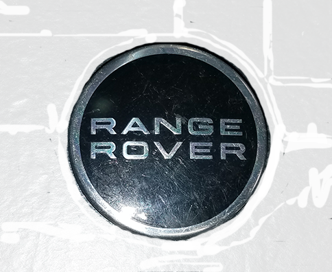 Land Rover Range Rover Wheel Center Cap with silver logo on black background