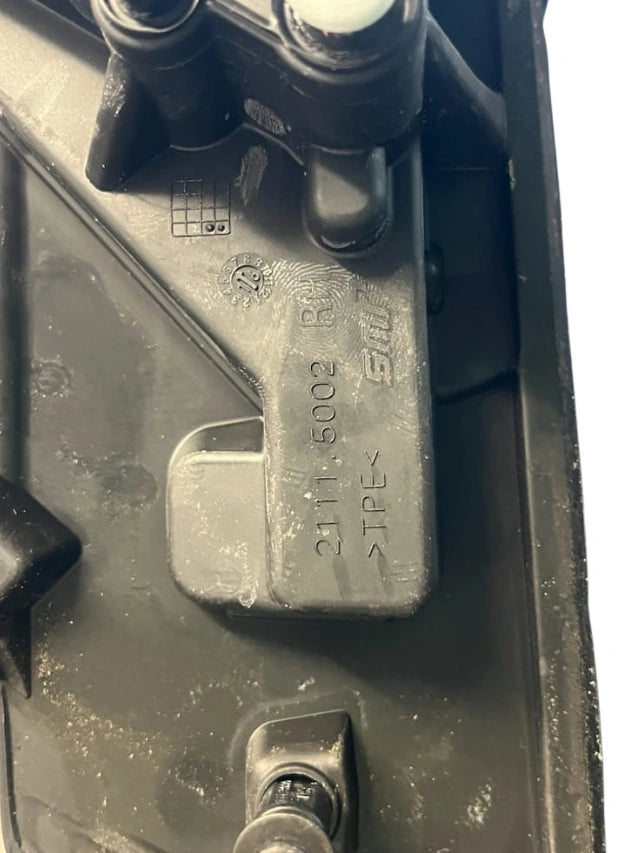 Roverland Parts Right Mirror plastic mounting base close up showing mounting posts part number and clips