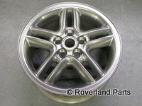 Range Rover alloy wheel rim in Hyper Silver Finish displayed front view with center cap and lug holes
