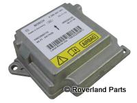 Range Rover part YWC000710 metal control module with warning labels and mounting tabs