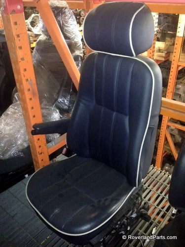 Range Rover front seats in black leather with white piping detailing and armrest