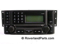 Range Rover Radio unit with buttons and display screen for vehicle audio control