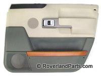 Range Rover beige and gray interior door trim panel with speaker and handle