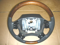 Range Rover steering wheel part with wood and leather finish for enhanced steering control