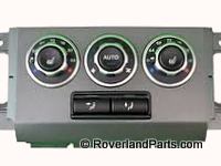 Range Rover temperature control panel with three adjustment knobs for climate settings