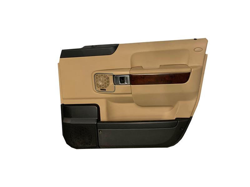 Range Rover beige and black interior door trim panel with wood accent and chrome handle