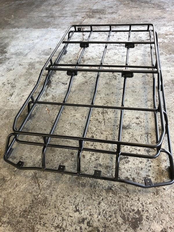 Discovery Parts black metal roof rack with sturdy frame for vehicle storage and transport