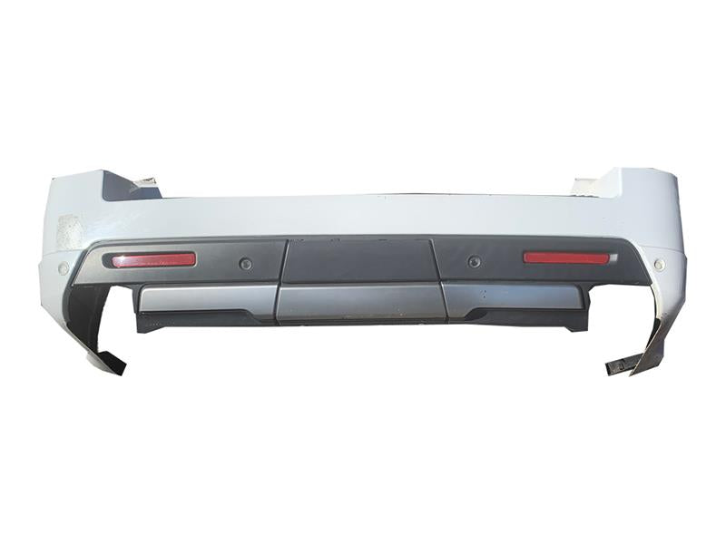 Range Rover rear bumper replacement part in white with integrated reflectors and black lower trim