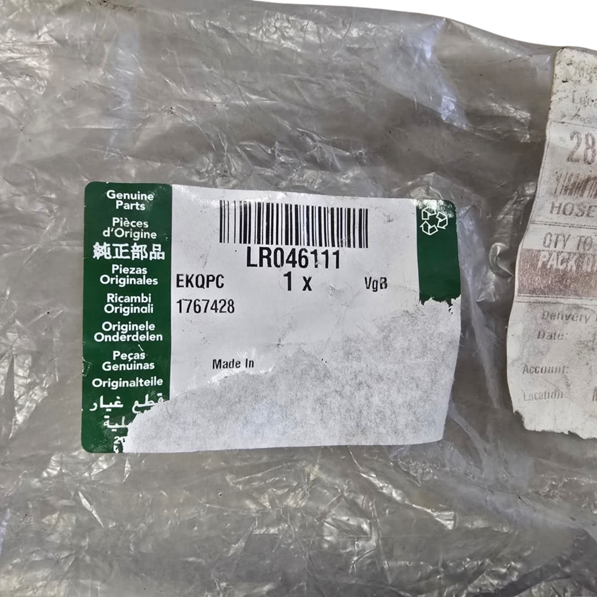 Roverland Parts Vacuum Hose packaged with a genuine parts label for optimal vehicle maintenance