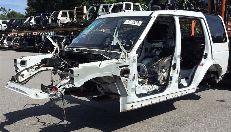 White LR3 LR4 Body Shell without engine and doors displayed outdoors